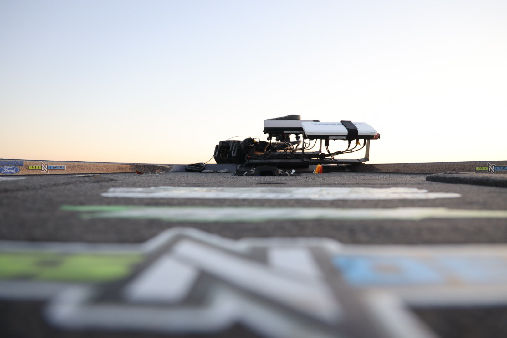 Deck of a bass boat covered in carpet decals